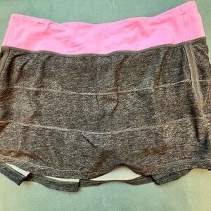 Lululemon vintage Grey with light pink band. Size 8.  Like new.